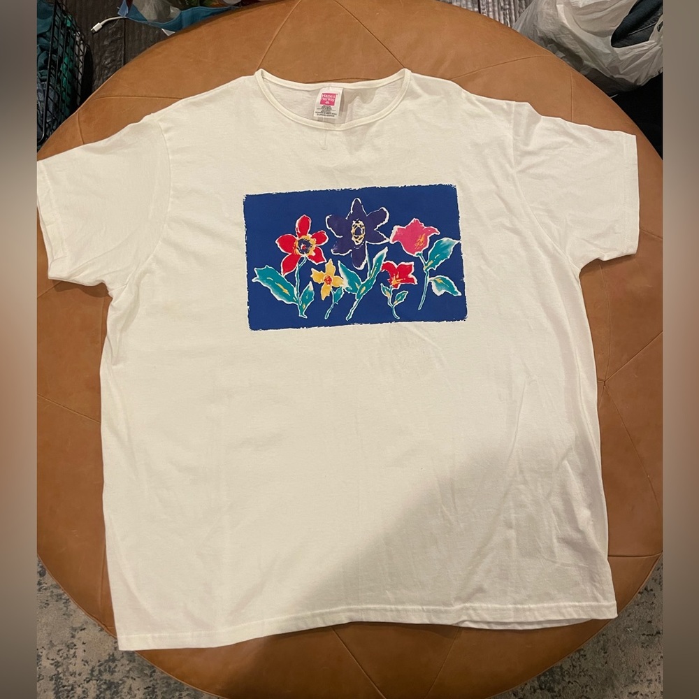 white short-sleeve tee with artsy flower graphic